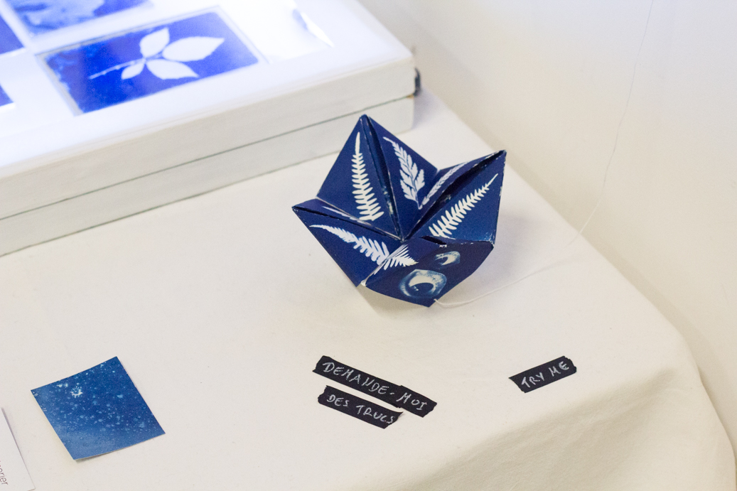 a paper fortune teller made with cynotype